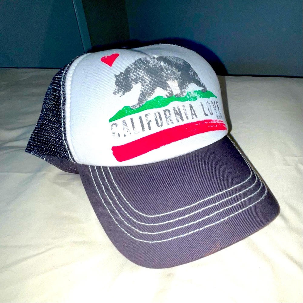 California Love, Billabong women’s baseball hat. Never worn, adjustable size